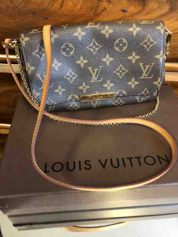 LOUIS VUITTON VYÖ  Antiikkiliike Wanha Elias